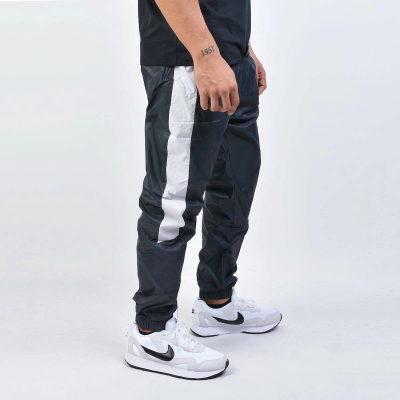 nike woven track joggers in black